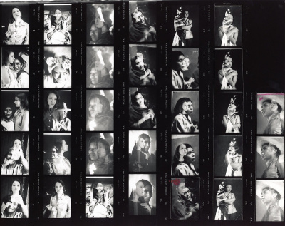 A contact sheet showing a series of black-and-white double-exposed photographs.