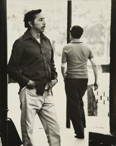 Image of Title Unknown (Two Men, One Facing Viewer, One Walking Away)