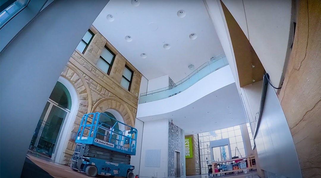 Wide angle still of the Museum's lobby moments before installation of Pae White's new mobile. 