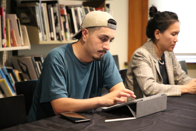 two participants using table devices
