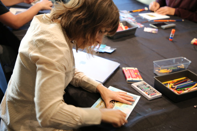 a female adult drawing