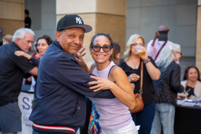two people dancing and smiling