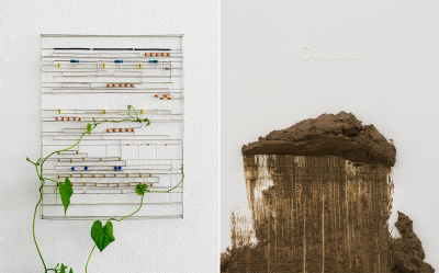 handmade wired sculpture of a motherboard and adobe mud scrapped on a panel with embossed text cututuk