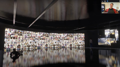 A 3d rendering of a dark gallery of digital signage wall of people singing
