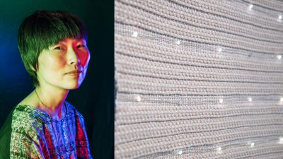asian woman with short hair; textile with LEDs embedded