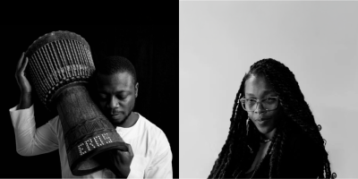 west african man with djembe and black american with long braided hair