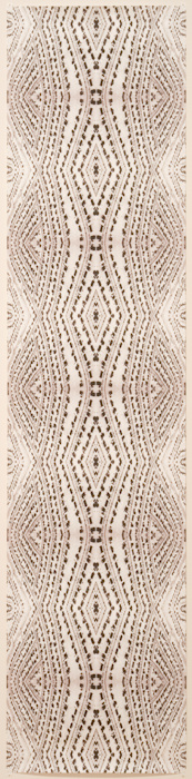 A vertical piece of crème/white colored material, with rows of black making patterns from top to bottom of half circle and diamond shapes, similar to a snake's pattern.