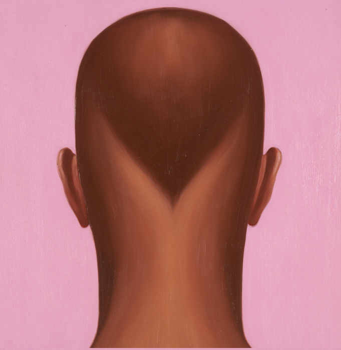 A portrait of the back of a brown man’s head against a pink background. He is not bald but has a very short haircut tapered to a point at his neck. Without seeing the man’s face, he looks like he could be in his twenties.
