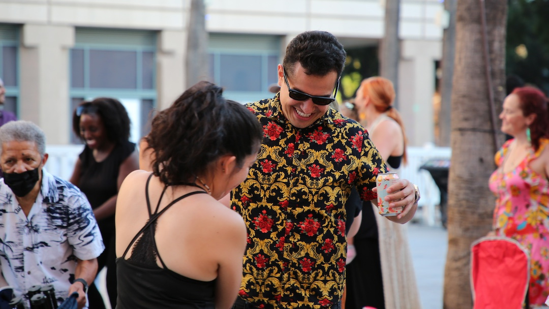 two people dancing and smiling