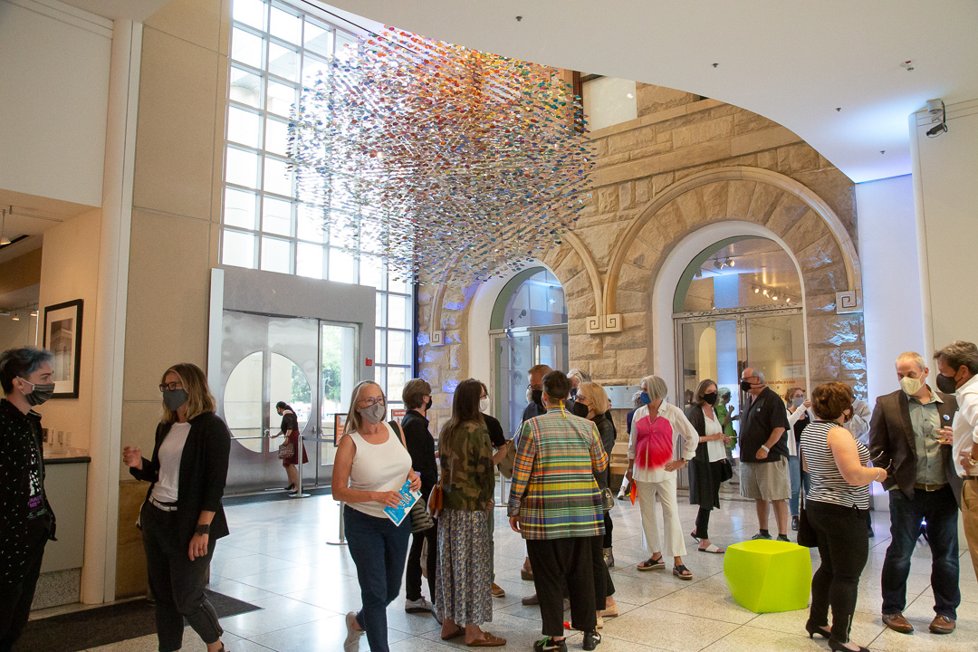 People congregated in the Museum's lobby.