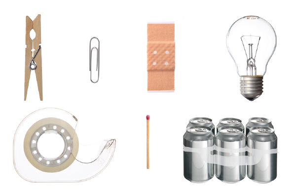 A photograph of 7 items on a white background. Starting from left to right on top row: wooden clothespin, metal paperclip, bandaid, light bulb. Second row: tape in clear dispenser, matchstick with red tip, 6 pack of silver cans still in the holder.