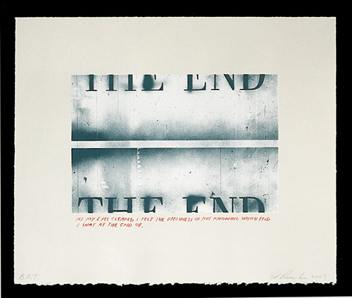 An image that resembles a film still. In the top half reads the bottom half of "the end." The top half "the end" is on the bottom half of the still, as though the image is meant to move and it's been interrupted. The font is new roman.