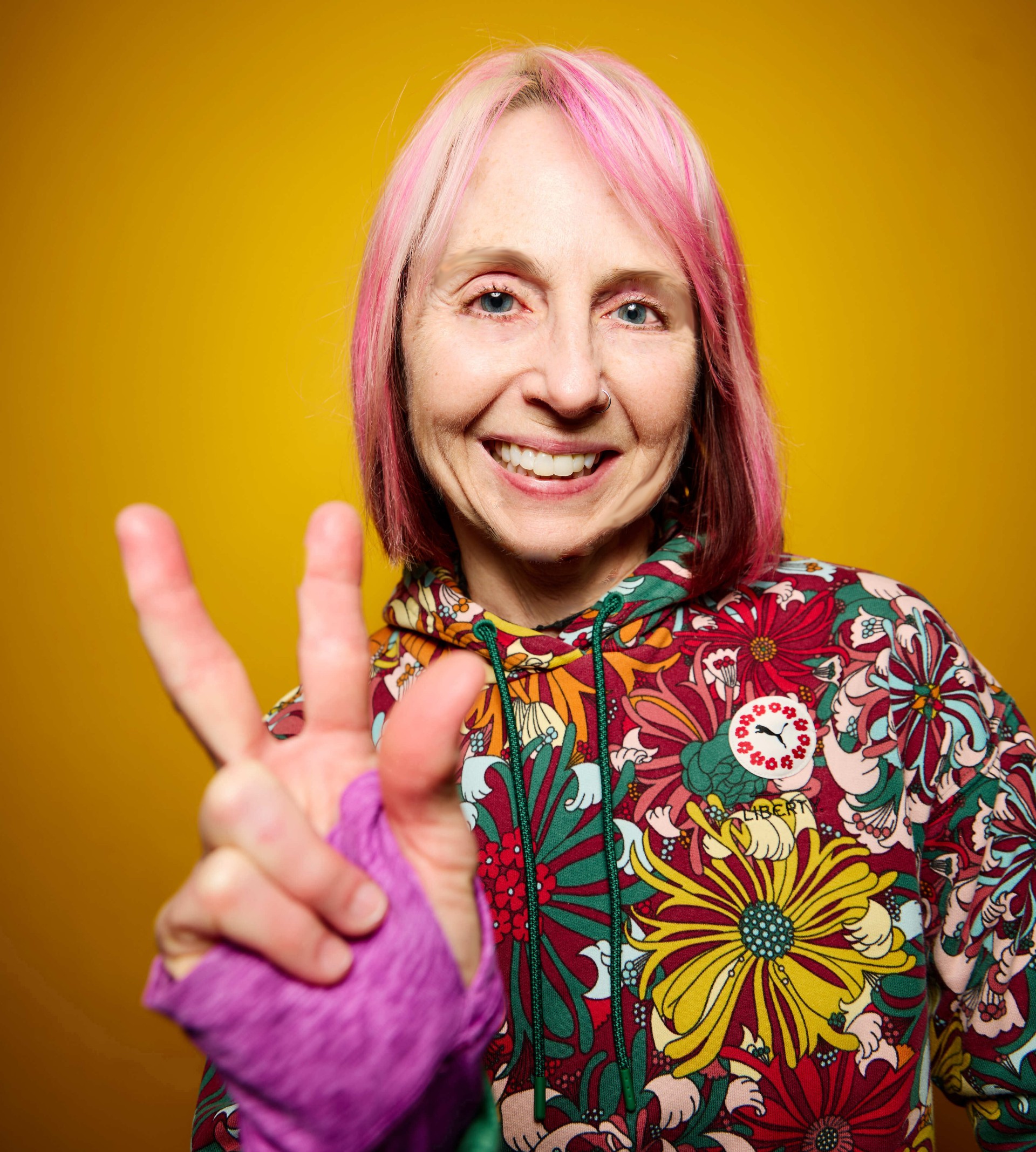 a woman with pink striped hair