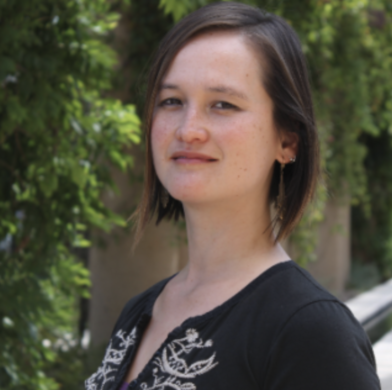 a woman with short straight dark brown hair