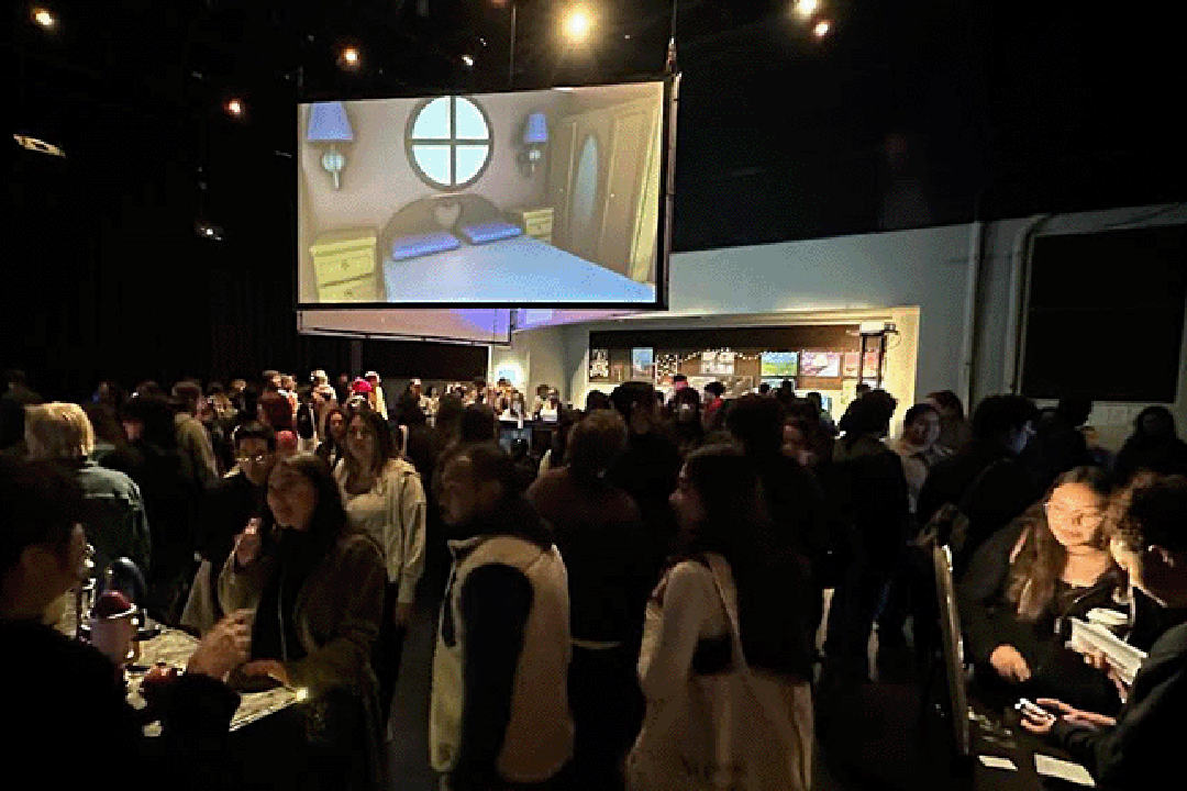 students in a busy dark space
